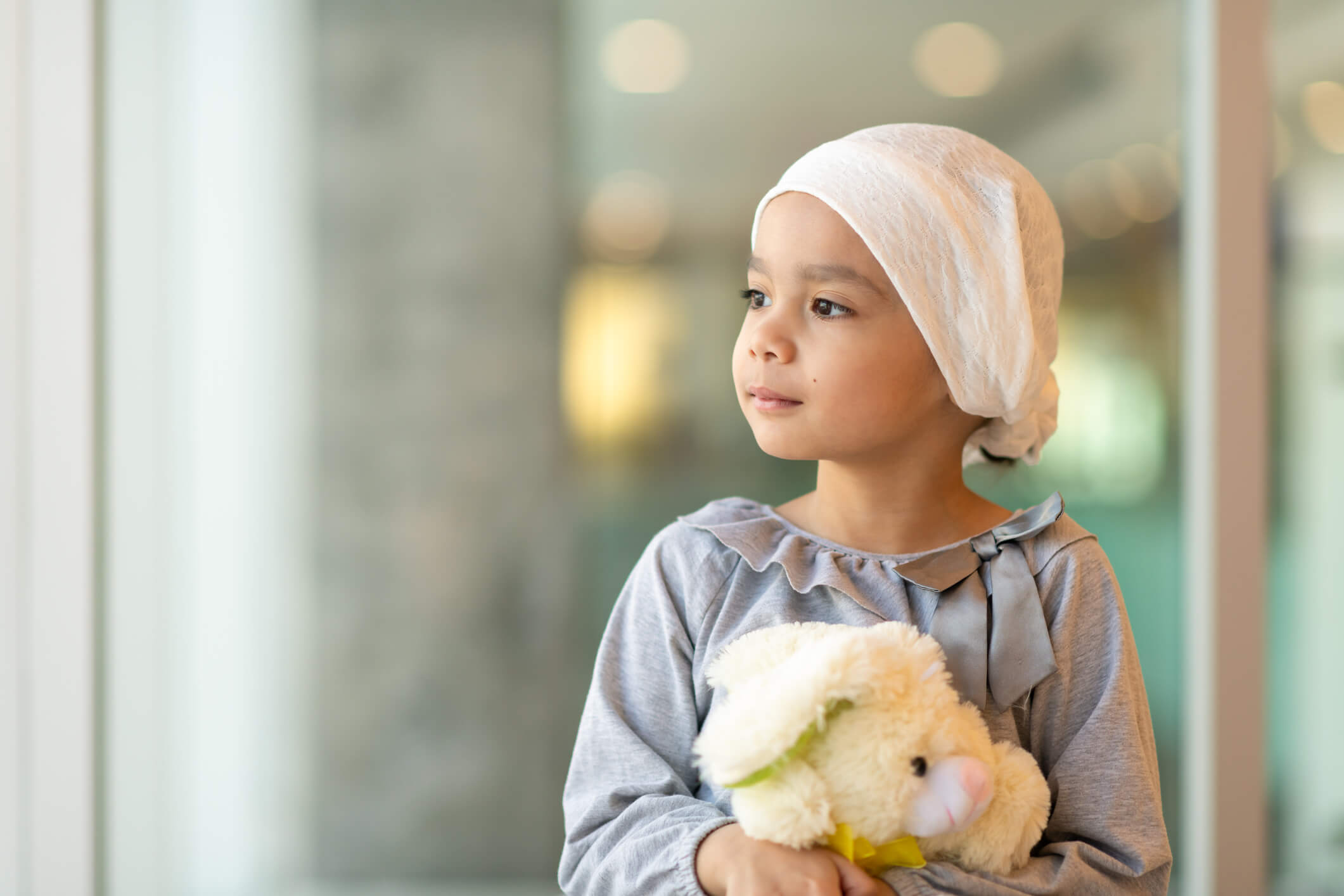 Little girl looking at outside